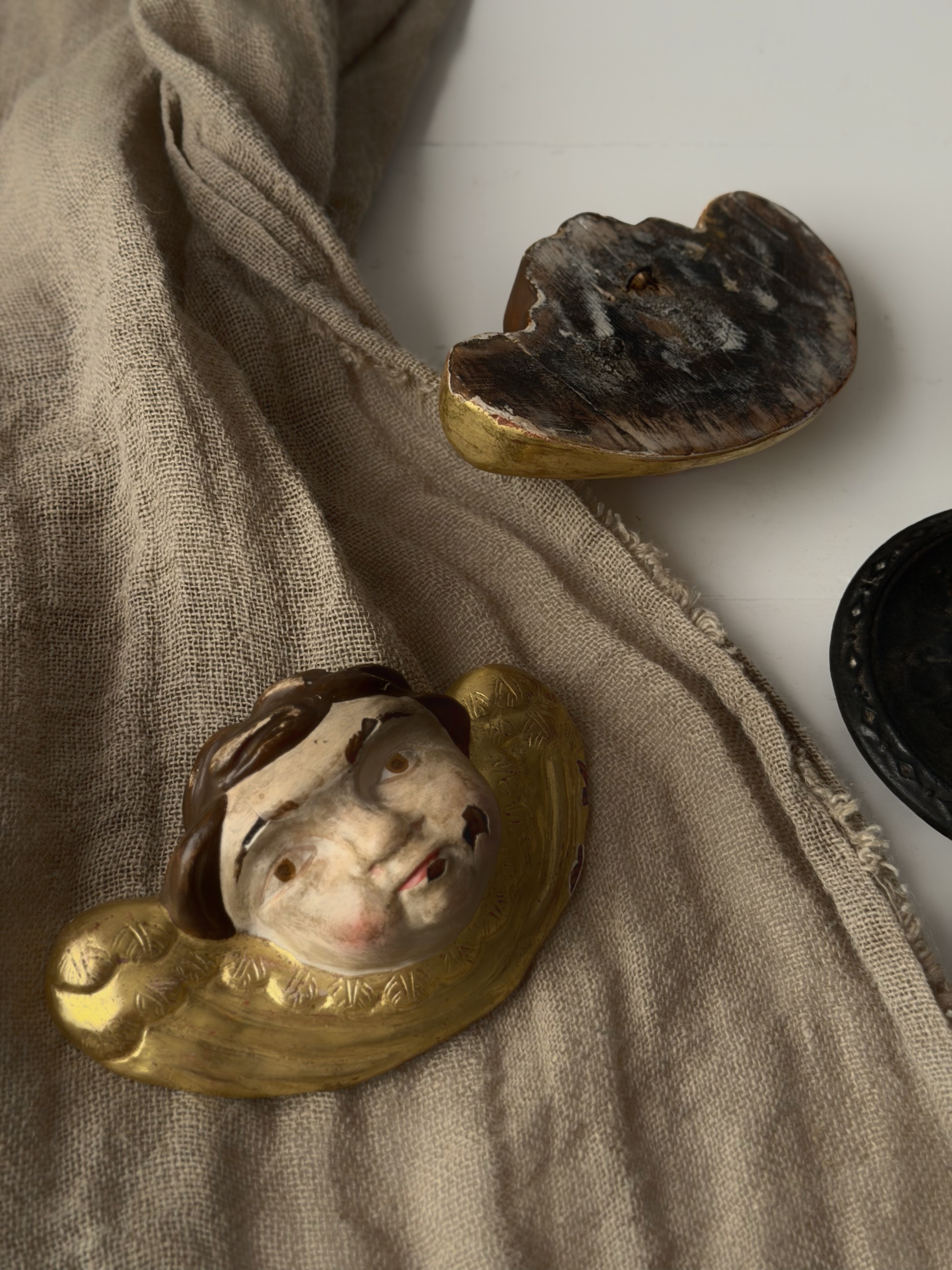Close up showing the authentic chipping of the polychrome paint and gesso